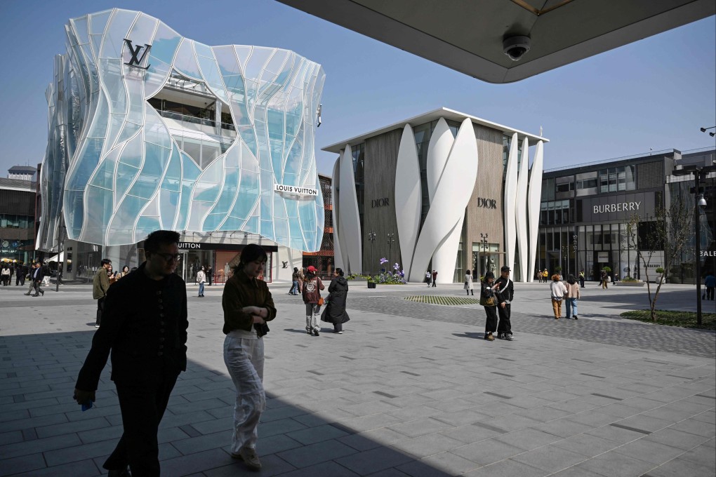 People visit a shopping center in Beijing on April 2, 2026. Photo: AFP