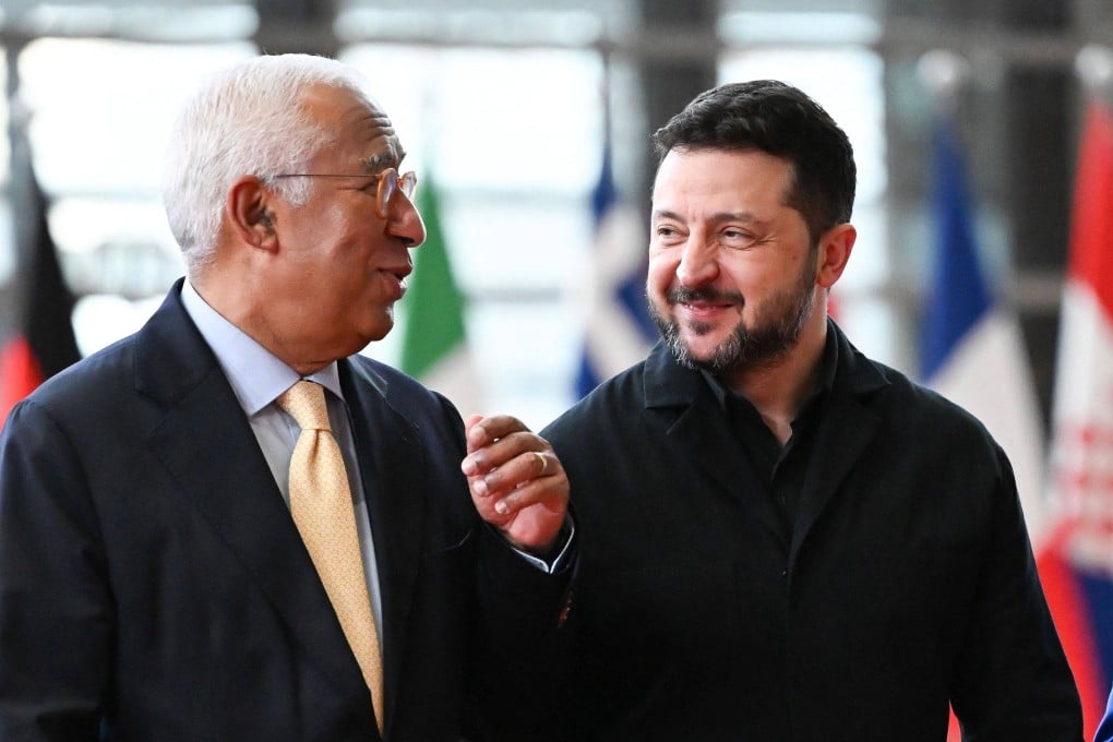 European Council President Antonio Costa (left) and Ukrainian President Volodymyr Zelensky arrive for an EU summit in Brussels on Friday. Photo: AFP