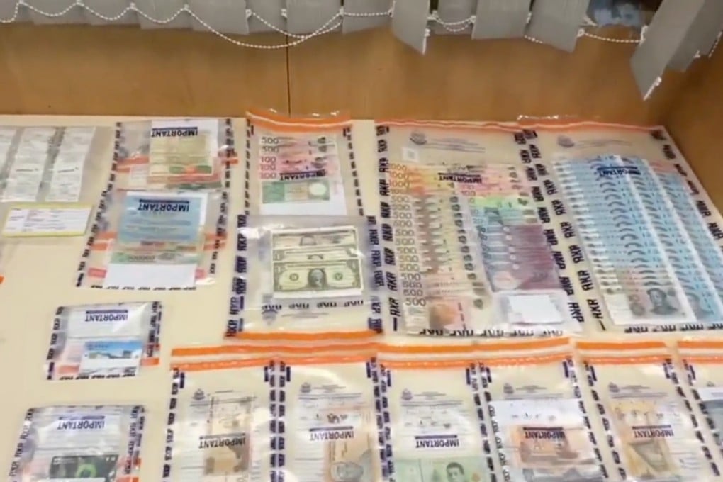 During Thursday’s operation, officers seized cash, credit cards and valuables, as well as clothes and shoes believed to belong to the suspects. Photo: Handout