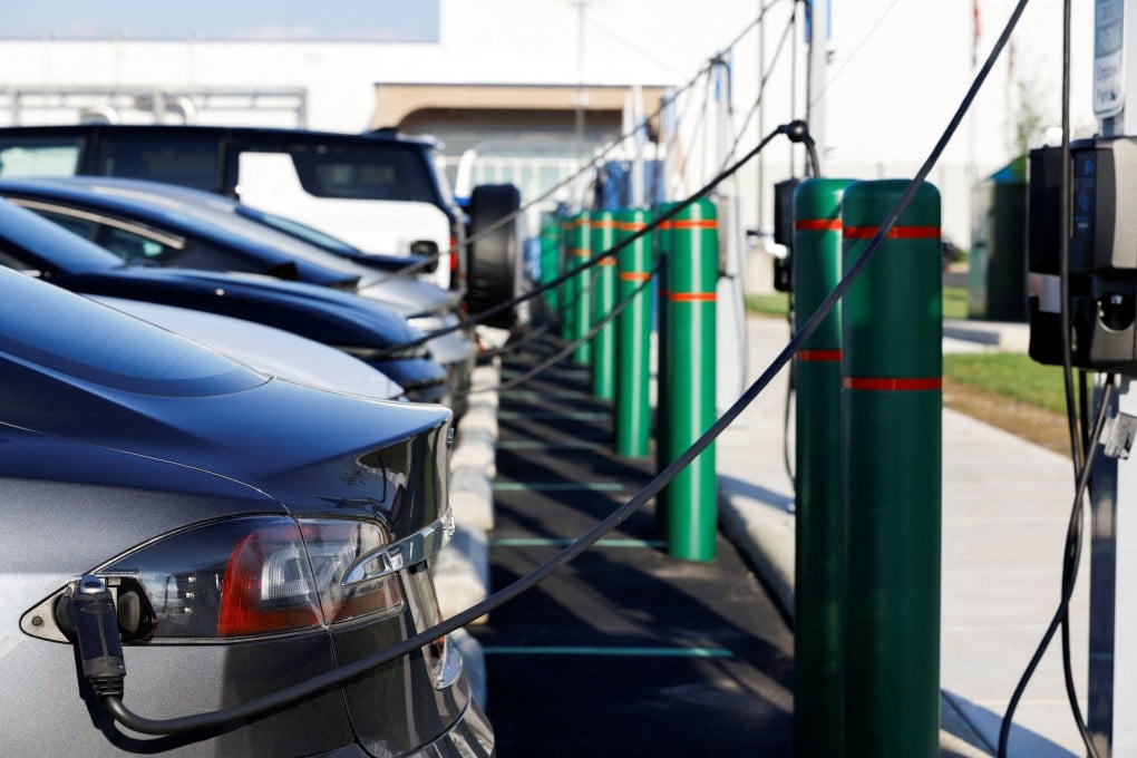 Electric vehicles charge in a car park in Lordstown, Ohio, in May. Photo: Reuters