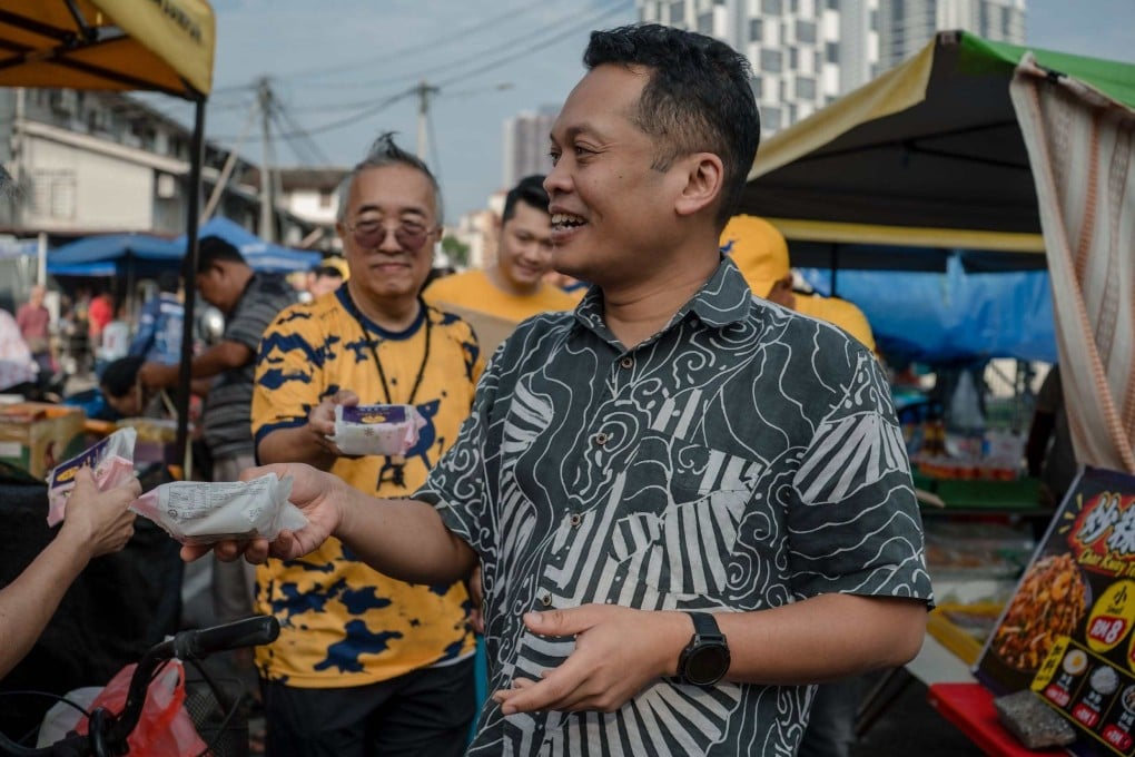 Nik Nazmi Nik Ahmad greets constituents at Setiawangsa on September 26. Photo: Facebook / niknazminikahmad
