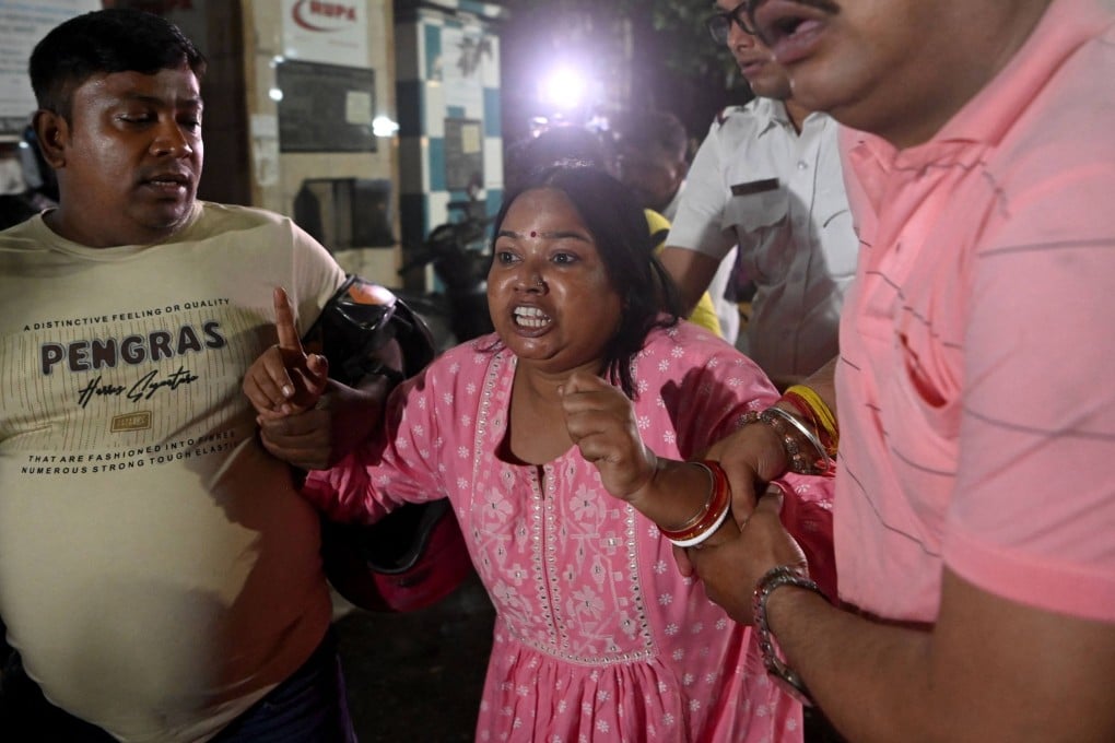 Relatives of stampede victims react outside Calcutta Medical College and Hospital in Kolkata on Saturday. Photo: AFP