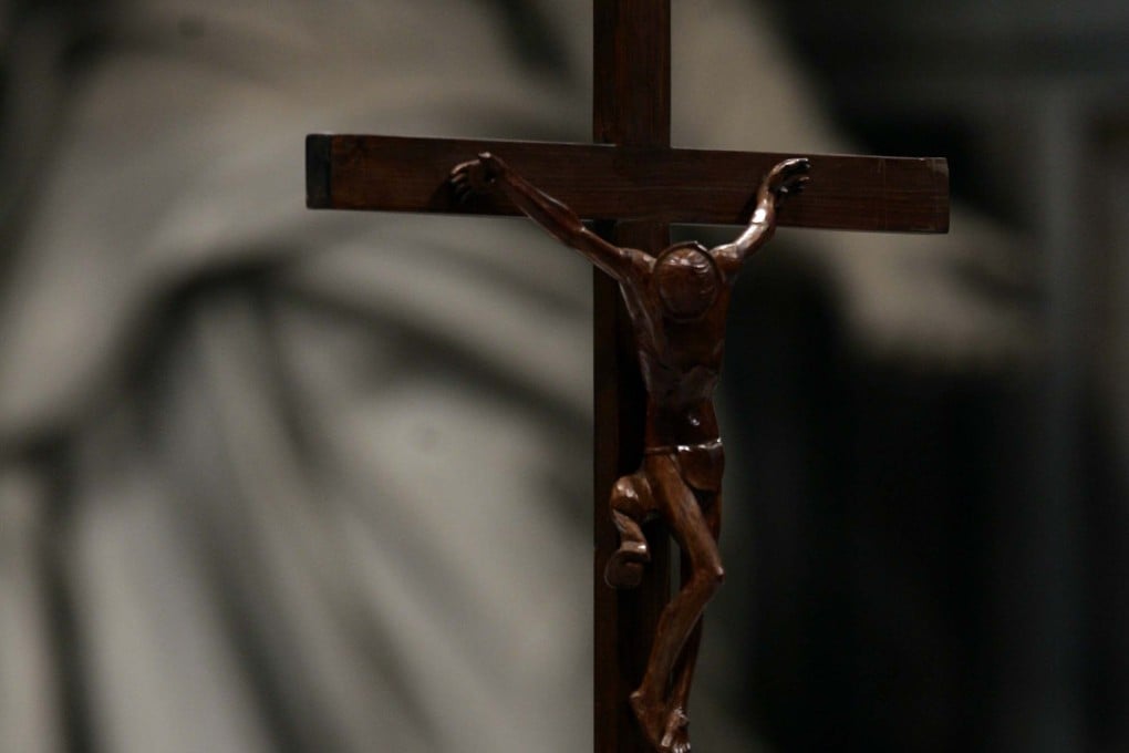 A wooden crucifix. On Saturday, a priest in Ecuador was killed by a falling wooden crucifix during a live-streamed mass. Photo: AP