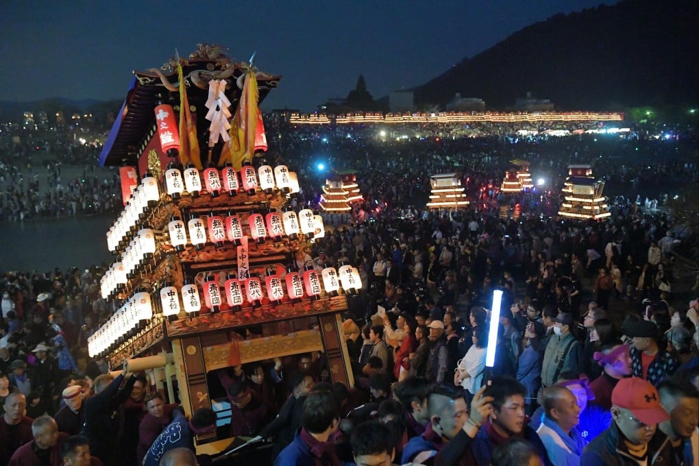 People carry floats during the annual Saijo festival in a previous year. Photo: The Asahi Shimbun via Getty Images