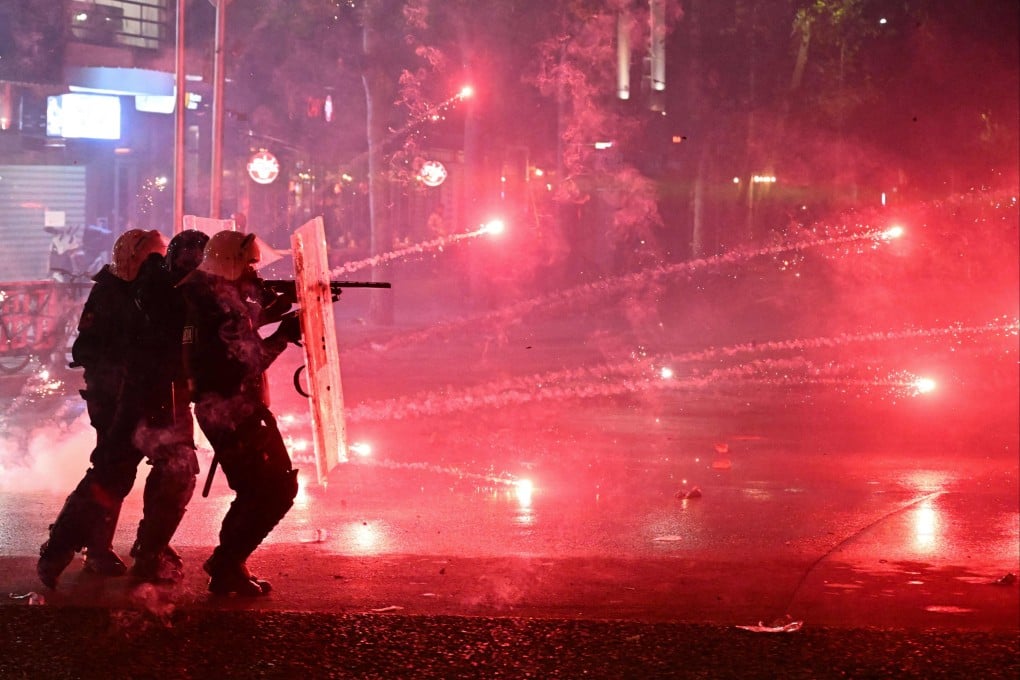 Riot police fire rubber bullets towards protesters during an anti-government demonstration in central Tirana, Albania on Sunday. Photo: AFP