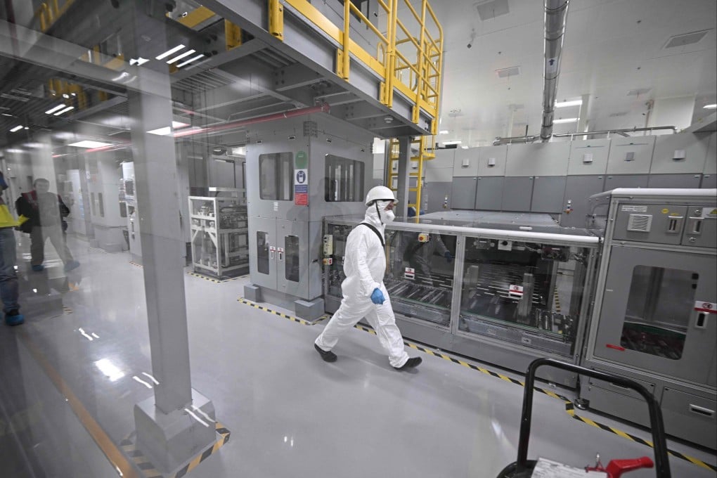 A worker walks through CATL’s battery cell plant in Debrecen, Hungary. Photo: AFP