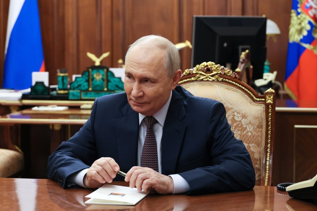 Russian President Vladimir Putin attends a meeting at the Kremlin in Moscow on Monday. Photo: EPA/Sputnik