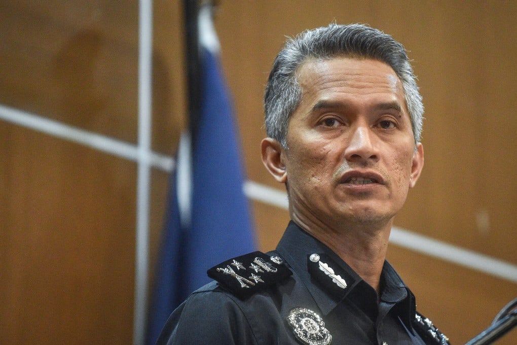 Mohd Shuhaily Mohd Zain, then police CID director, speaking in Kuala Lumpur in May 2024. Shuhaily is now head of Malaysia's border agency, and pleaded not guilty on Wednesday to assaulting two officers at KLIA. Photo: AFP