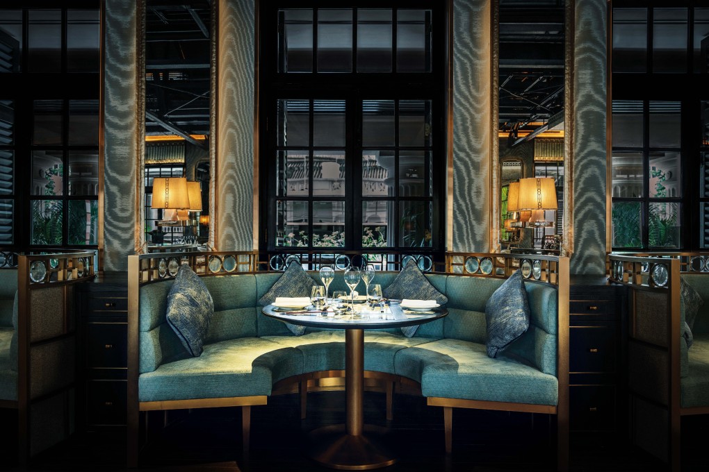 The Chinese Library has high ceilings, jade walls, ornate mirrors and onyx screens.