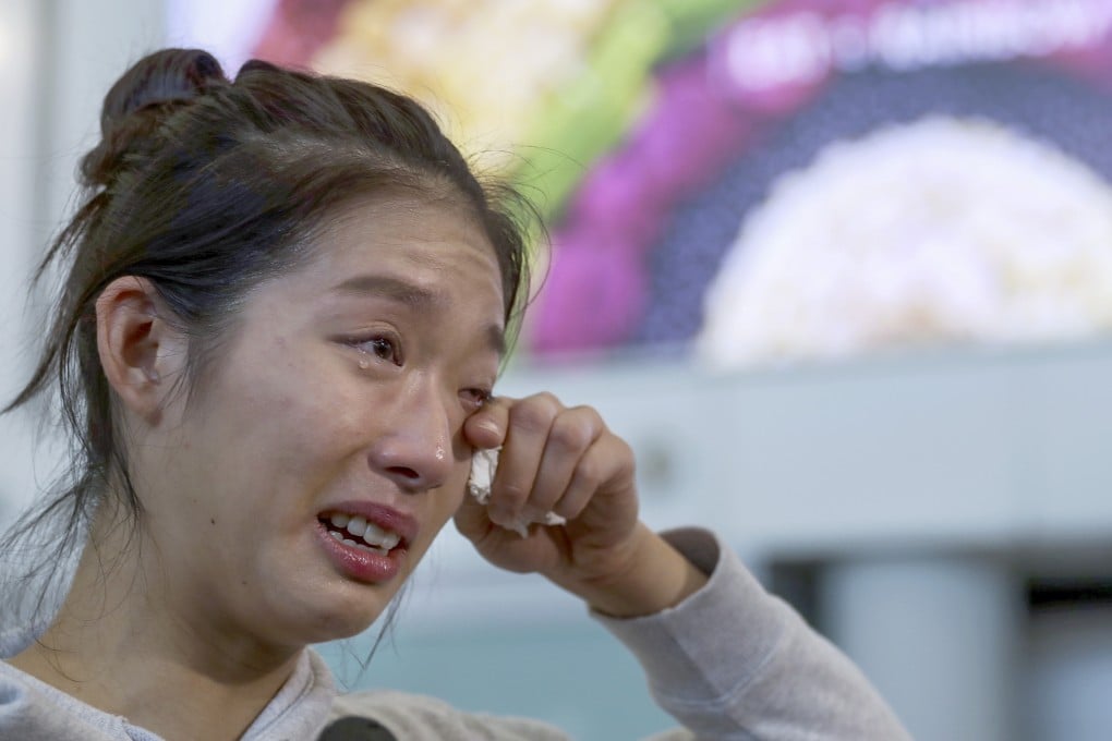 Vivian Kong cries tears of joy as she returned to Hong Kong to meet the press on Tuesday. Photo: Handout