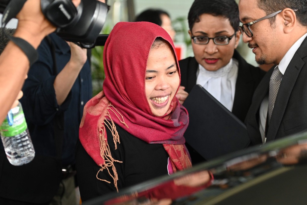 Indonesian national Siti Aisyah smiles as she leaves the Shah Alam High Court. Photo: AFP