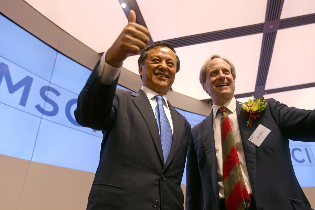 Hong Kong Exchanges and Clearing Limited (HKEX) chief executive Charles Li Xiaojia (L) with MSCI Inc’s managing director Baer Pettit at the MSCI's A-share inclusion ceremony and press briefing at the HKEX at Exchange Square in Central on 31 May 2018. Photo: SCMP/Xiaomei Chen.
