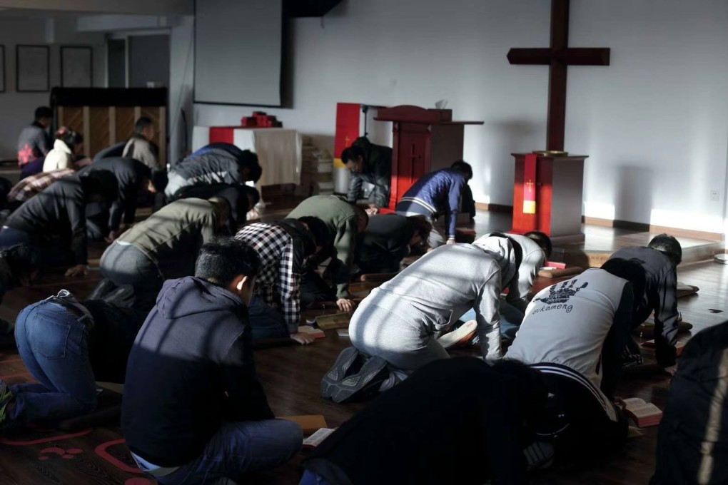 Christians pray at the Early Rain Convenant Church in Chengdu. It has been closed by the government. Photo: Facebook