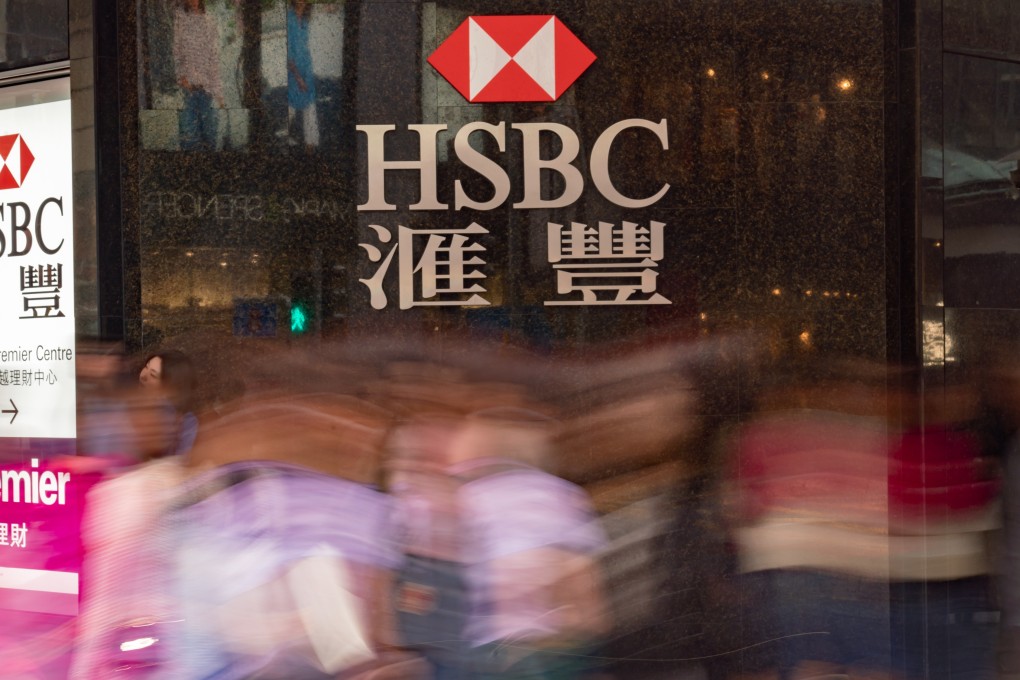Pedestrians walk past an HSBC bank branch in Central, Hong Kong. Photo: Bloomberg