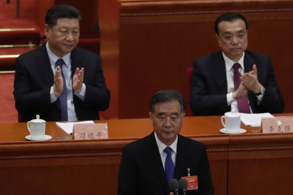 Wang Yang (centre), flanked by Chinese President Xi Jinping (left) and Premier Li Keqiang at the China People’s Political Consultative Conference on Wednesday in Beijing. Photo: EPA-EFE