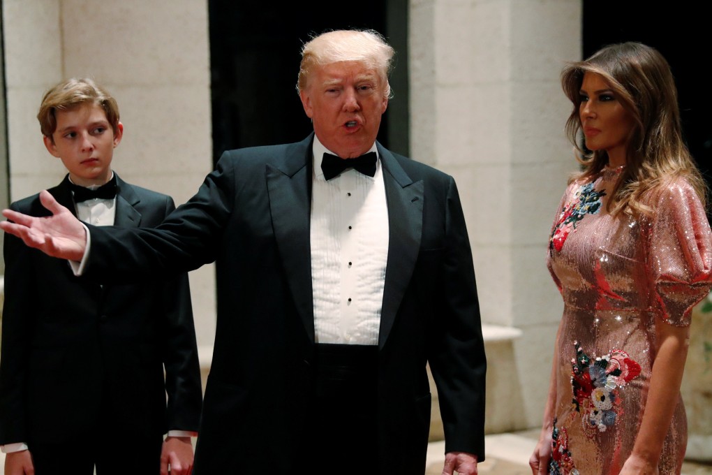 US President Donald Trump, First Lady Melania Trump and their son, Barron, arrive for a New Year’s Eve party at Trump’s Mar-a-Lago club in Palm Beach, Florida, on December 31, 2017. Photo: Reuters