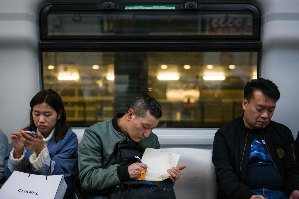 Most people are likely to turn a blind eye if faced with rudeness on public transport. Photo: AFP