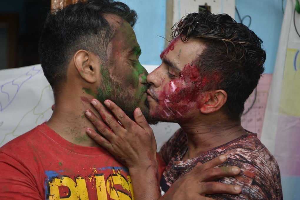 Men celebrate the Supreme Court decision to strike down a ban on gay sex, in Siliguri, West Bengal, on September 6, 2018. Picture: AFP