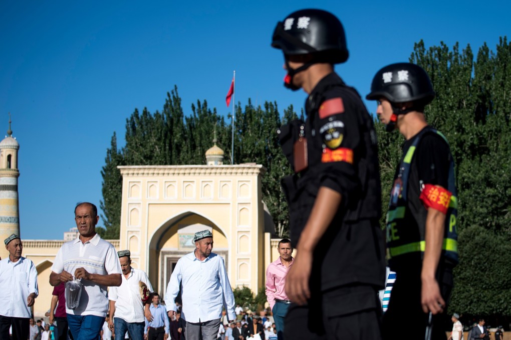 Police on patrol in Kashgar in Xinjiang. Photo: AFP
