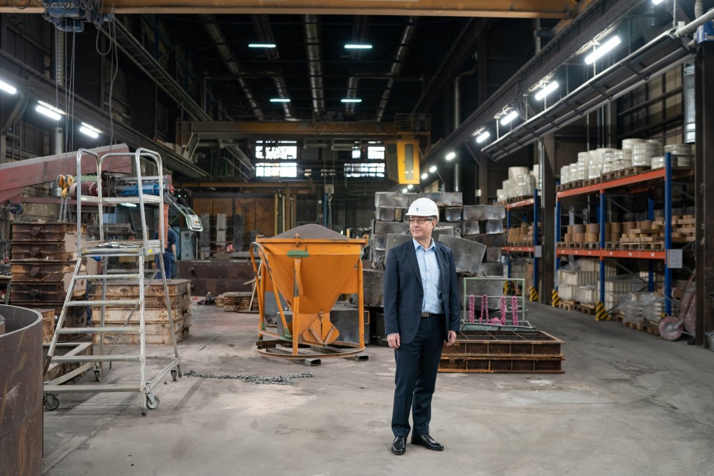 Bernward Reif, CEO of Otto Junker, looks over the factory floor at the company's metals plant in Simmerath, Germany, on February 19. The slowdown in Chinese growth has hit manufacturing hard in Europe’s biggest economy, with orders and output sharply contracting in January. Photo: Bloomberg