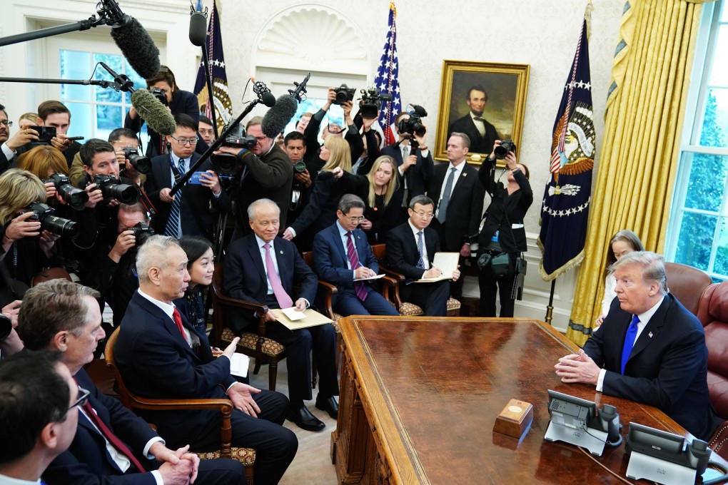 China’s Vice-Premier Liu He (third left) meets US President Donald Trump in the White House on February 22. Photo: AFP