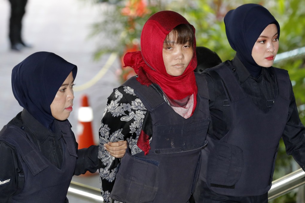 Doan Thi Huong, centre, arrives at Shah Alam High Court in Malaysia on Thursday. Photo: AP
