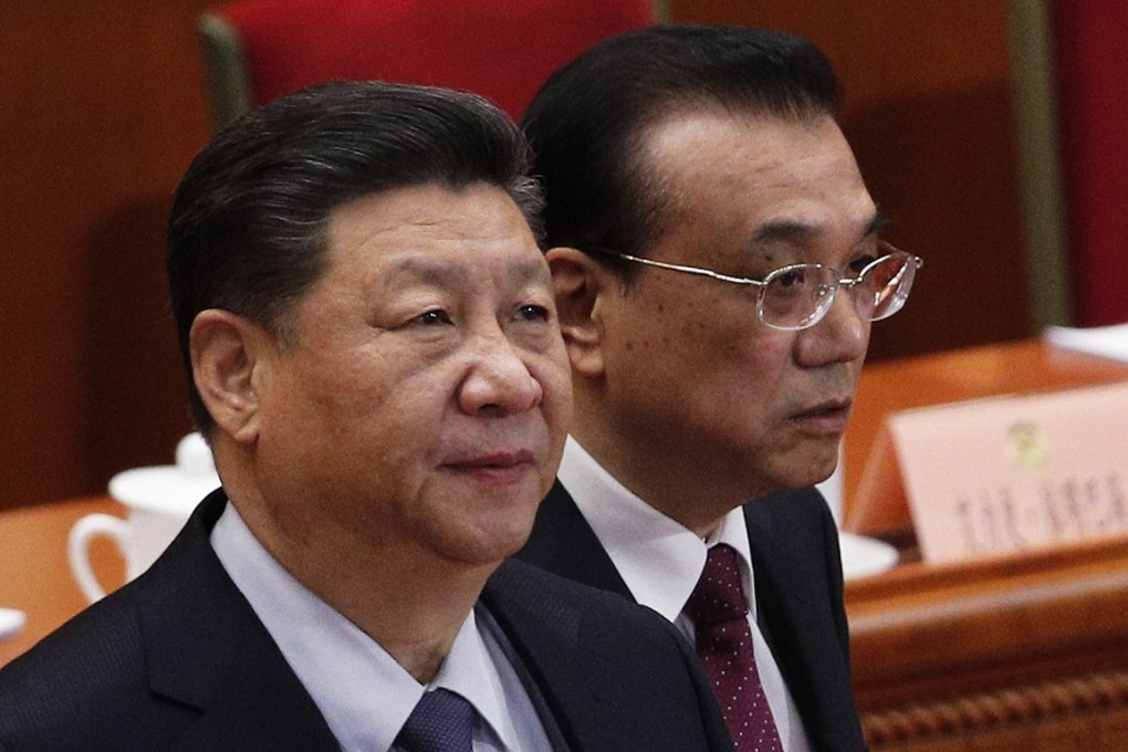 Chinese President Xi Jinping, left, and Premier Li Keqiang arrive for the closing session of the Chinese People's Political Consultative Conference (CPPCC) at the Great Hall of the People in Beijing, Wednesday, March 13, 2019. (AP Photo/Andy Wong)