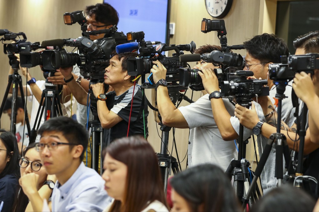 Reporters should offer a balanced perspective, rather than focusing on just one side of a story. Photo: Nora Tam