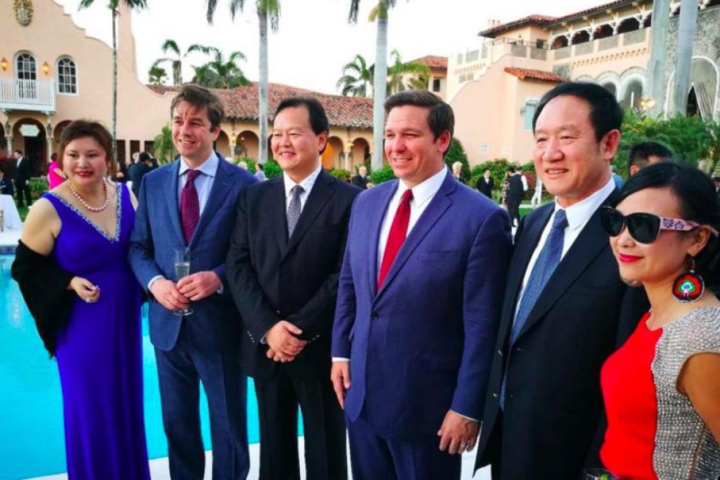Future Florida governor Ron DeSantis (centre) attended a pro-Israel gala at Mar-a-Lago on February 25, 2018. The event was also attended by Cindy Yang (far left). Photo: Facebook/Miami Herald/TNS