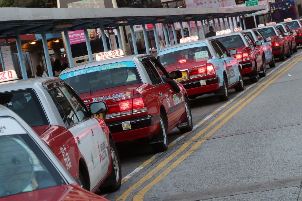 The taxi queue at the Tsim Sha Tsui Star Ferry Pier. An alliance of 27 taxi groups has asked for an increase in minimum fares in Kowloon and Hong Kong Island to HK$30. Photo: K.Y. Cheng
