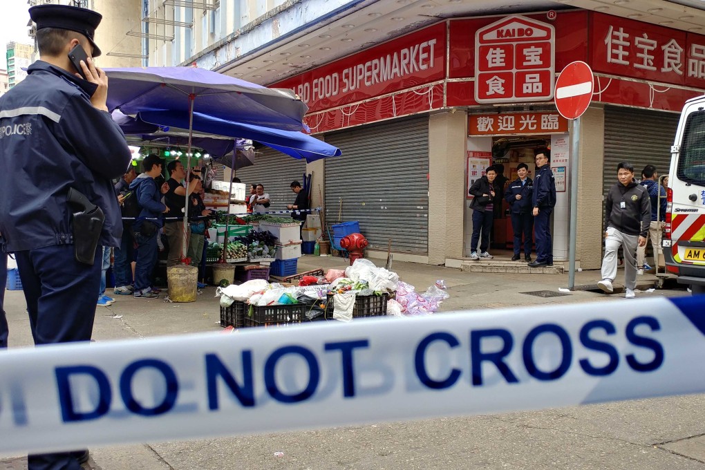 Police investigate at the scene on Saturday. Photo: Felix Wong