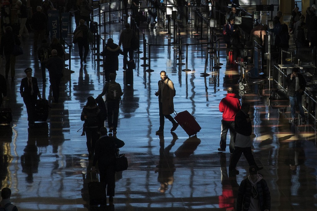 Passengers move through Ronald Reagan National Airport, in Washington on November 21, 2018, a day before the Thanksgiving holiday. The normal numbing reality of air travel haunts deep parts of every air traveller’s brain. Photo: Getty Images/AFP