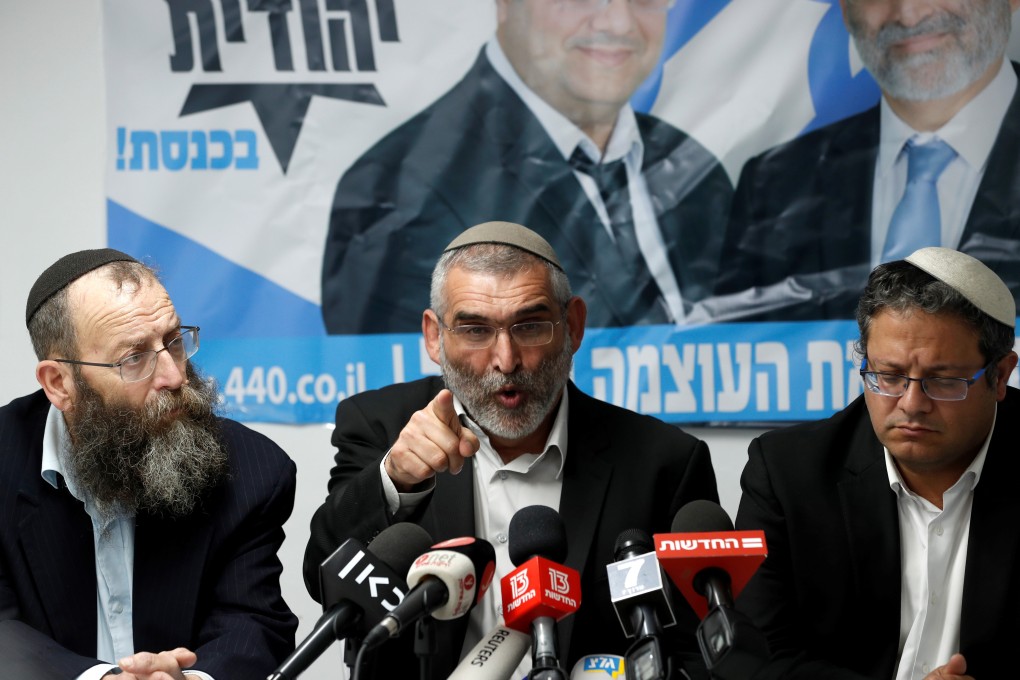Michael Ben-Ari from the Jewish Power party delivers a statement to the media together with his party's members, Baruch Marzel and Itamar Ben-Gvir in Jerusalem. Photo: Reuters