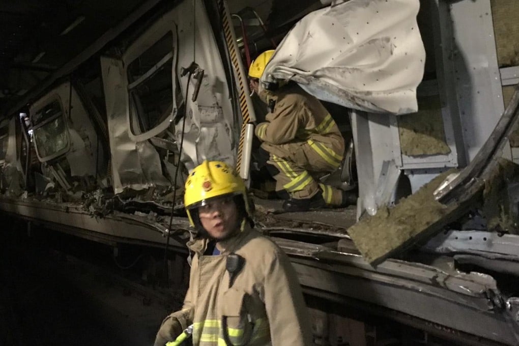 Firefighters at the site of Monday’s crash. Photo: MTR Corp