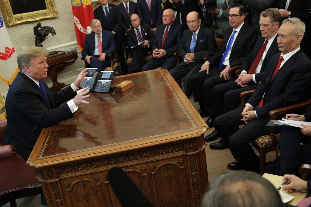 President Donald Trump speaks during a meeting with Chinese Vice Premier Liu He, right, as other US officials look on, at the White House in Washington on February 22. With the deadline for China-US trade talks having been delayed, the US side has alternated between optimism and stating that tough negotiations remain. Photo: TNS