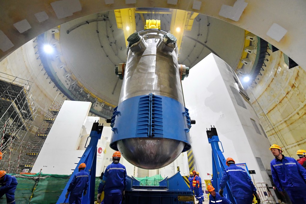 Workers install a reactor pressure vessel at China National Nuclear Corporation’s Fuqing nuclear power plant in southeast China’s Fujian province, on January 28, 2018. Photo: Xinhua