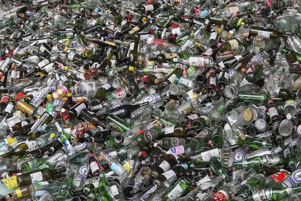 Collected glass bottles are crushed into glass sand at Hong Kong Glass Reborn’s recycling plant in Yuen Long. Photo: Nora Tam 20FEB19 SCMP / Nora Tam