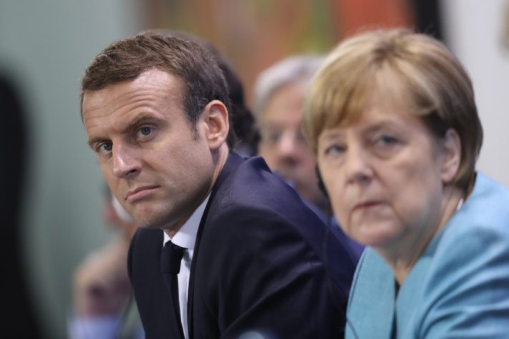 German Chancellor Angela Merkel (right) and French President Emmanuel Macron after a meeting of EU leaders in Berlin, in 2017. Photo: Getty Images