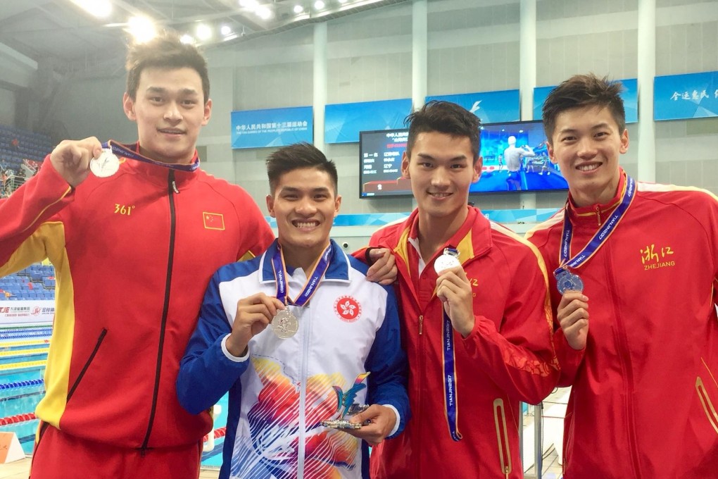 Kenneth To King-him (second left) with Sun Yang (left) and their joint relay team at the 2017 China National Games. They won silver. Photo: Facebook/Kenneth To