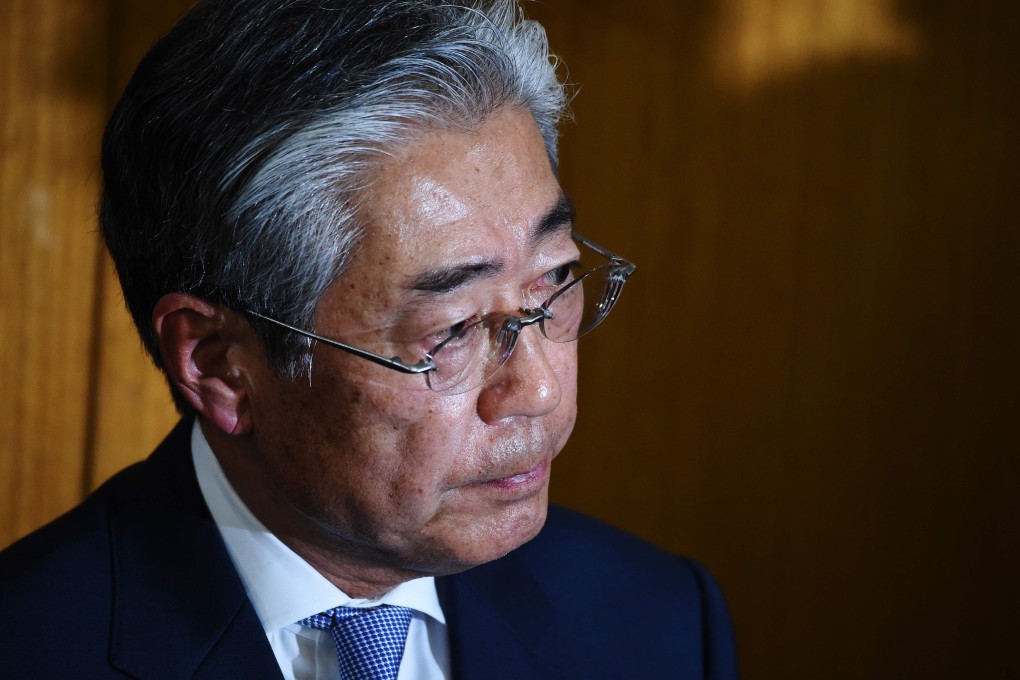 Japanese Olympic Committee President Tsunekazu Takeda announces his planned resignation. Photo: AFP