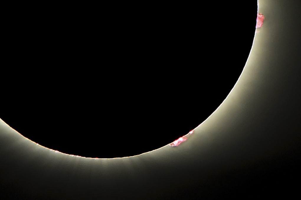 Solar flares seen as the sun emerges from a total eclipse by the moon in August 2017. Photo: AP