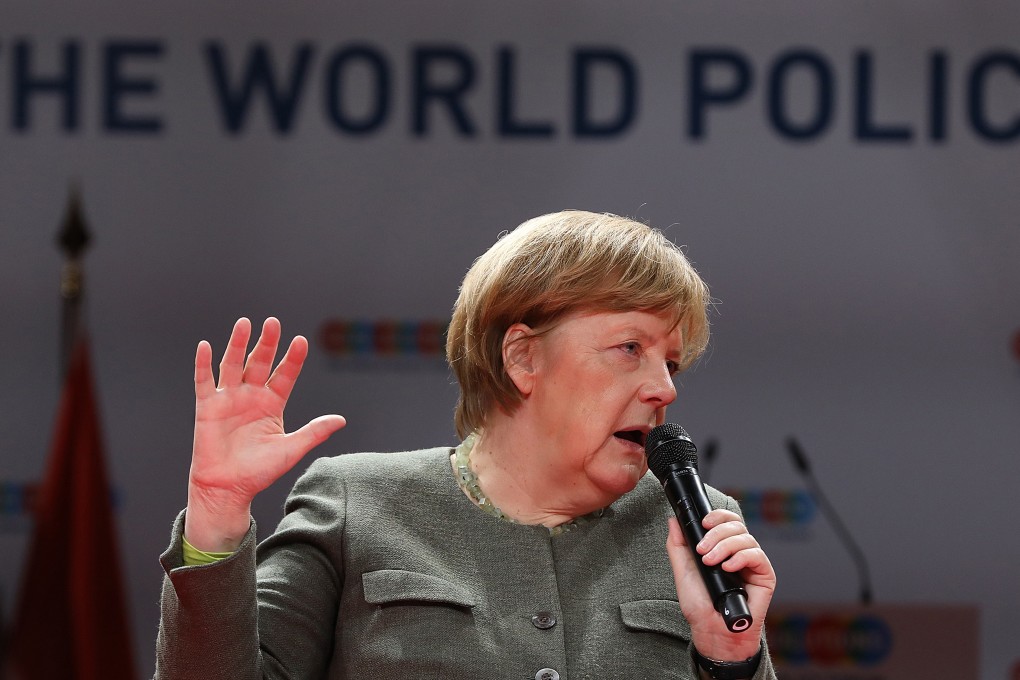 German Chancellor Angela Merkel speaks during a question-and-answer session at the Global Solutions World Policy Forum in Berlin on Tuesday. Photo: Bloomberg/Krisztian Bocsi
