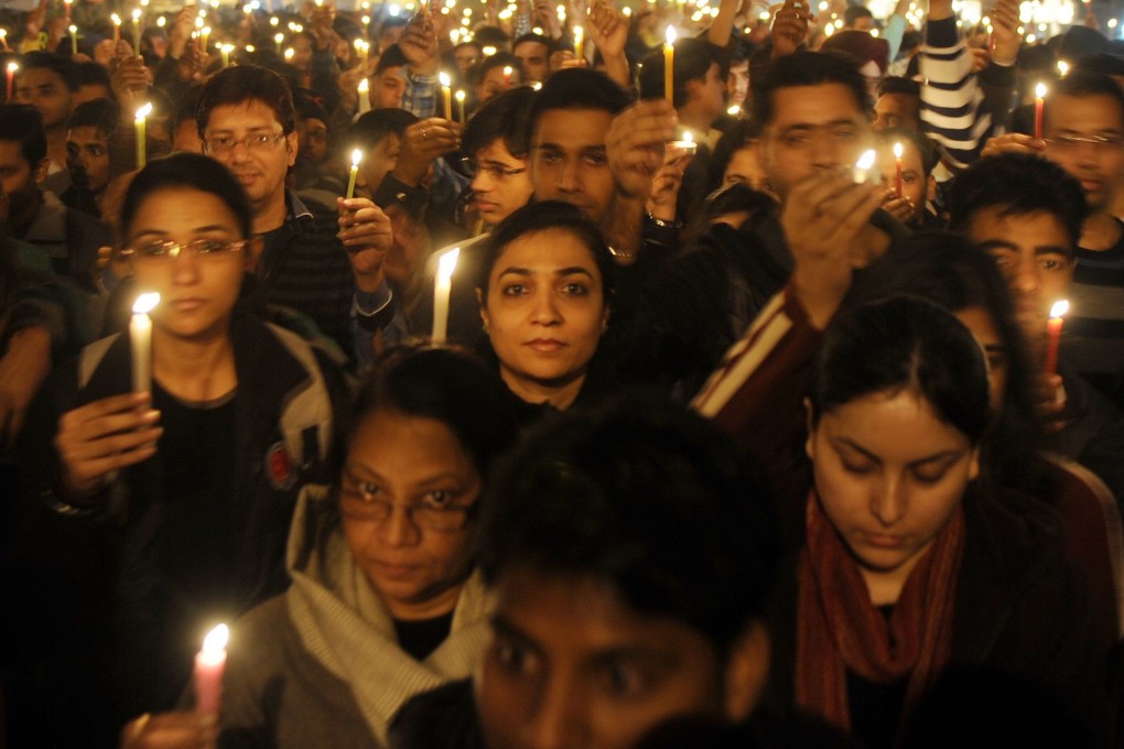 Indian protesters hold candles during a rally in New Delhi, following the gang rape of student Jyoti Singh. Photo: AFP