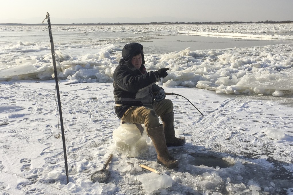 Ice fishing in Khabarovsk, Russia. Photo: Chris Taylor