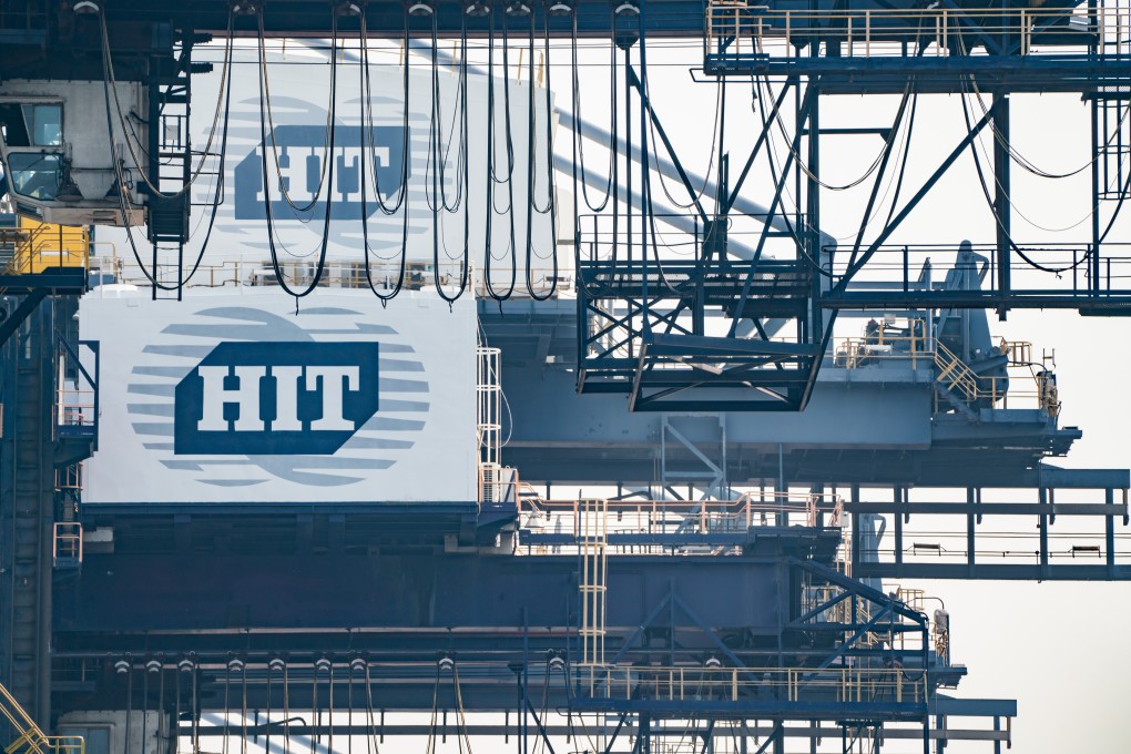 Signage for Hong Kong International Terminal (HIT), a unit of CK Hutchison, is displayed on gantry cranes at Container Terminal 9 at Kwai Tsing Container Terminal in Hong Kong, on January 22, 2019. Photo: Bloomberg