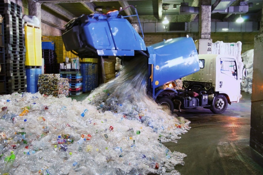 Plastic bottles pile up at a collection facility in Tokyo. Photo: Kyodo