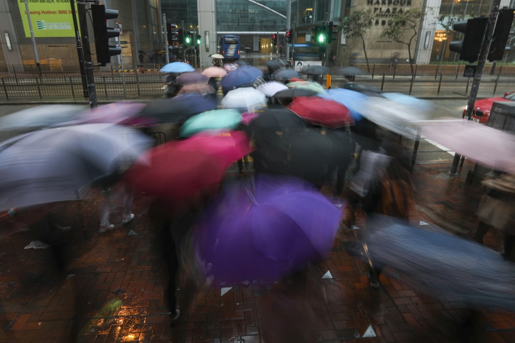 Commuters and their umbrellas in North Point, Hong Kong, in February. Photo: Xiaomei Chen