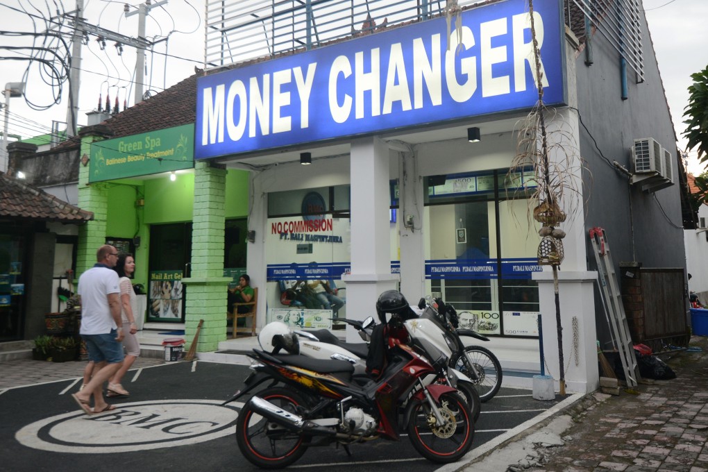 A money exchange shop in Bali. Photo: AFP