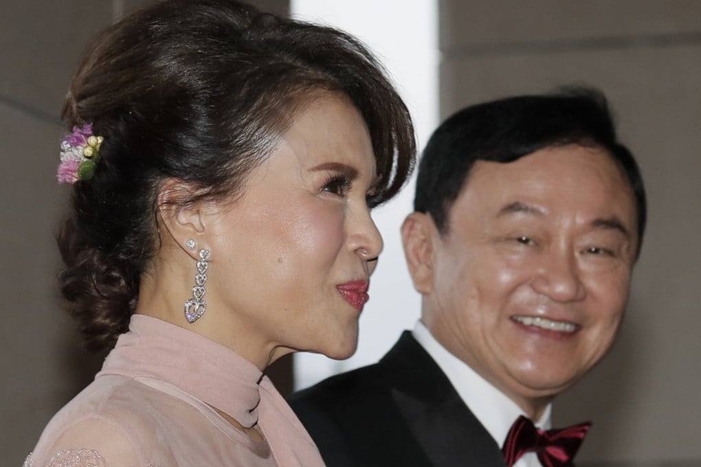 Former Thailand Prime Minister Thaksin Shinawatra welcomes Princess Ubolratana of Thailand as they arrive for the wedding of Thaksin's youngest daughter Paetongtarn "Ing" Shinawatra at a hotel in Hong Kong. Photo: AP