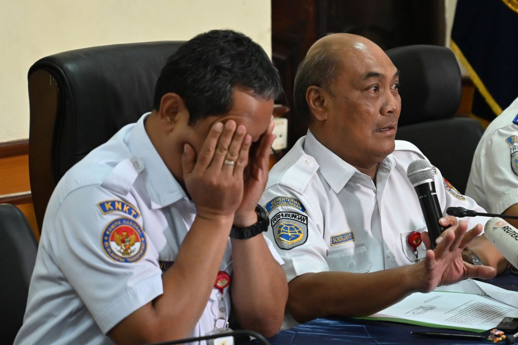 Representatives of Indonesia's national transportation safety committee brief journalists on their latest findings. Photo: AFP
